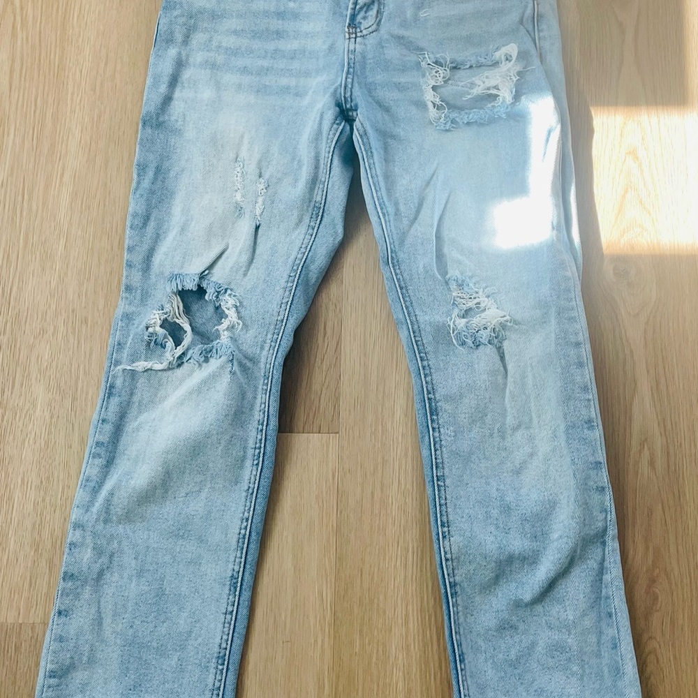 Distressed Light Blue Jeans
